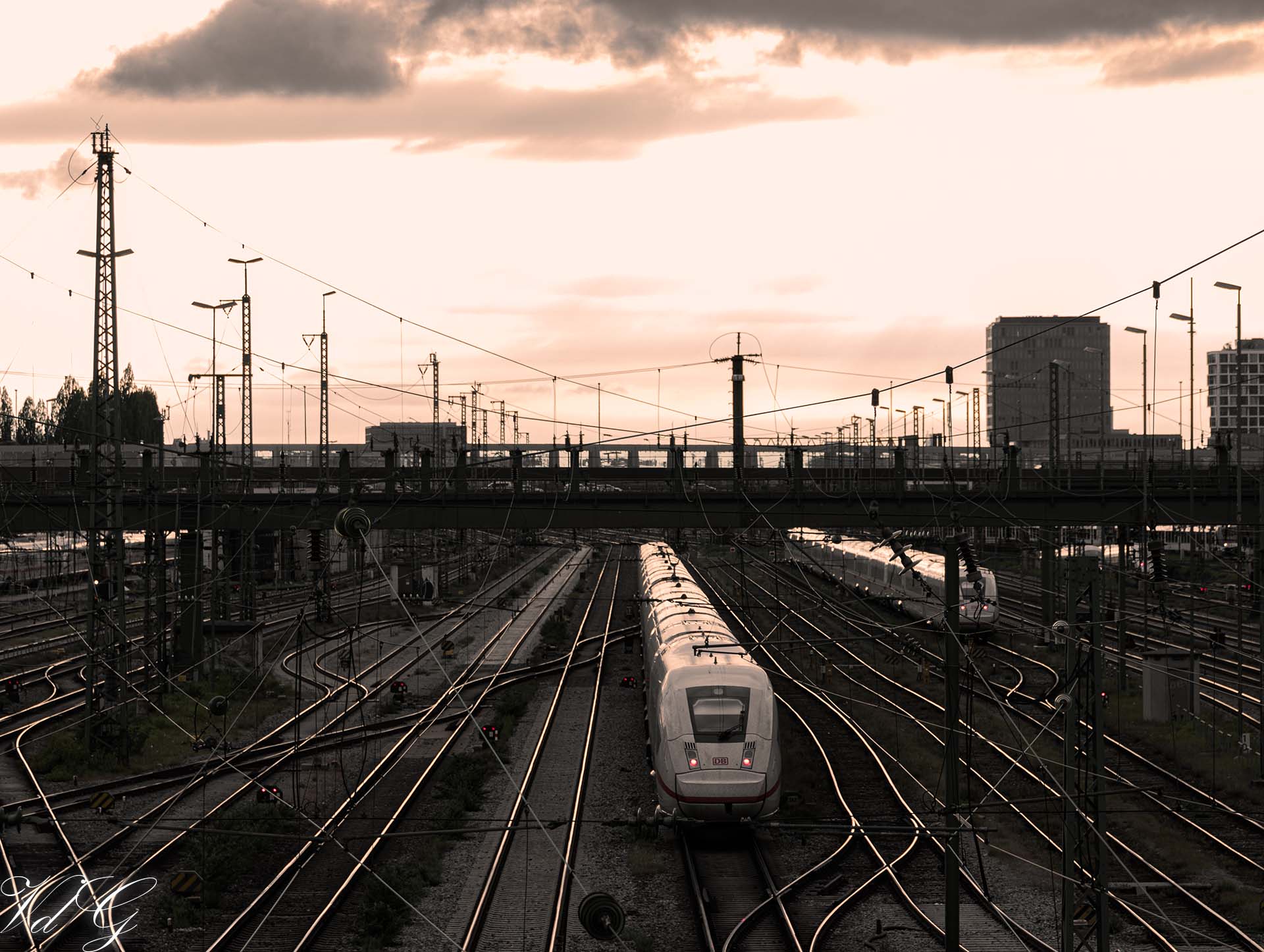 Train departing into the setting sun (2023)